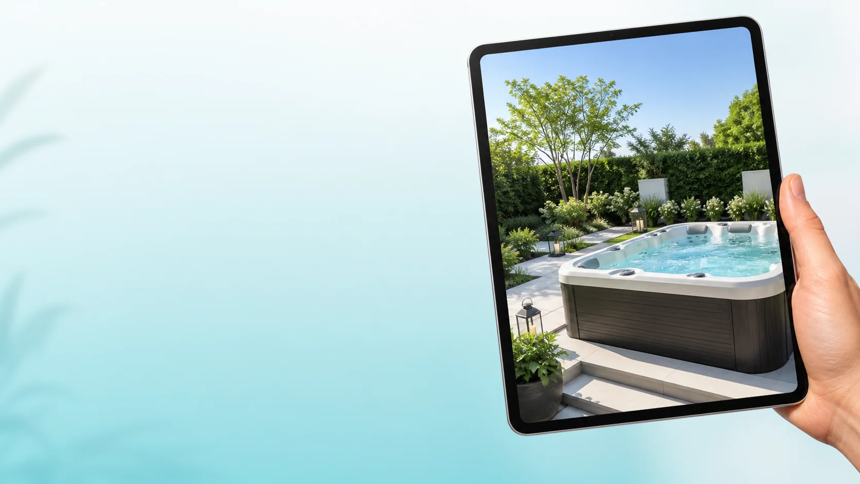 Hand holding an iPad showing a backyard hot tub scene