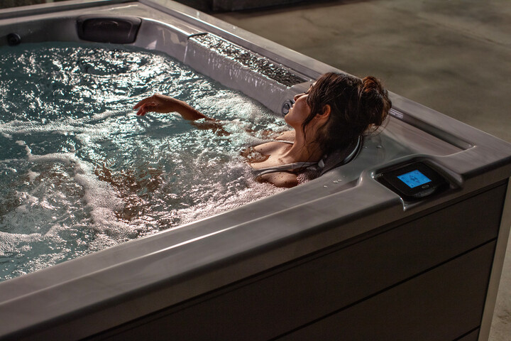 hot tub temperature - women enjoying her hot tub