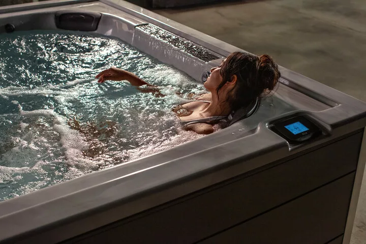 is a jacuzzi®️ worth it? woman enjoying her jacuzzi hot tub