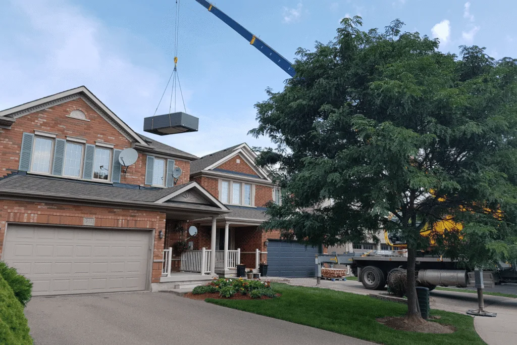 A crane lifting a swim spa