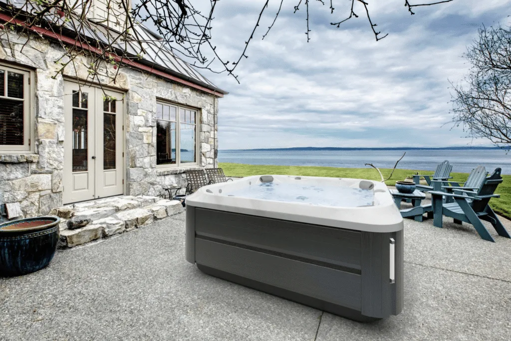 A hot tub on a concrete floor, outdoor