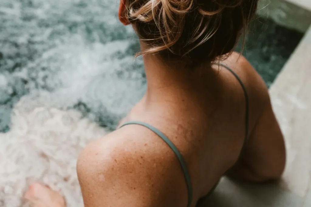 a woman relaxing in a hot tub