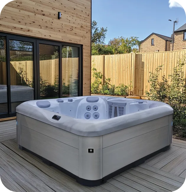 Family gathered around a backyard hot tub year round